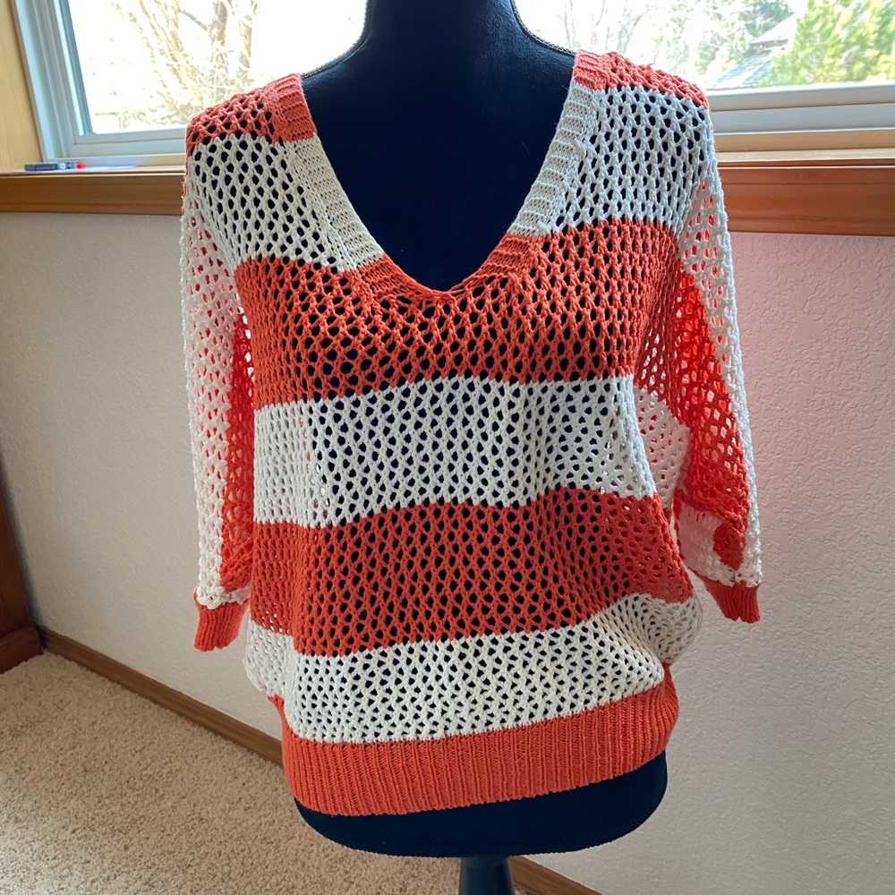 Orange striped sweater
